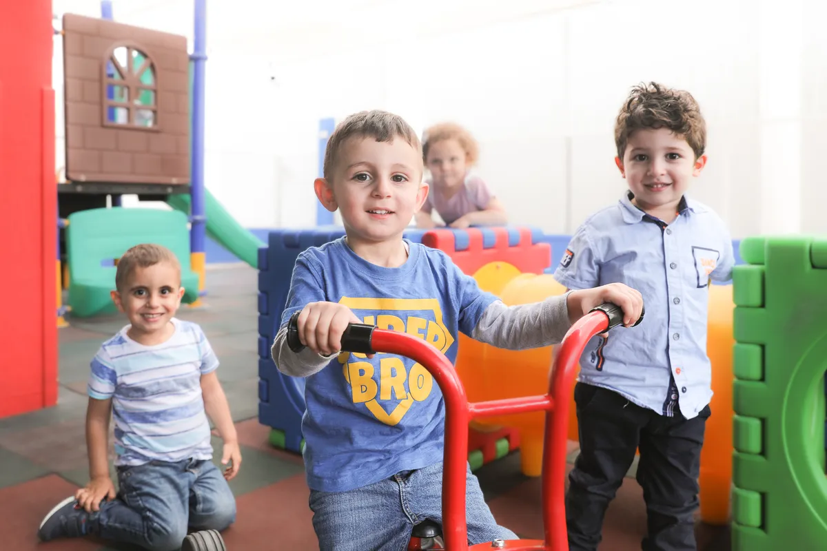 Children playing and learning together socially